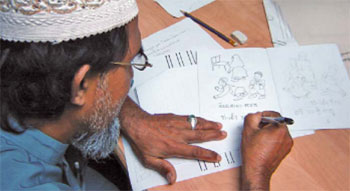 A villager writing a story using Thai-based Patani Malay