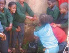 Children using an ABE water-point