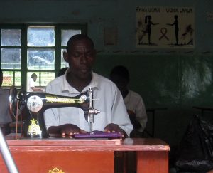 Learning tailoring in Tanzania (EENET photo library)