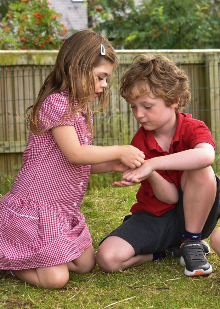 Outdoor activities as part of a primary school music class.